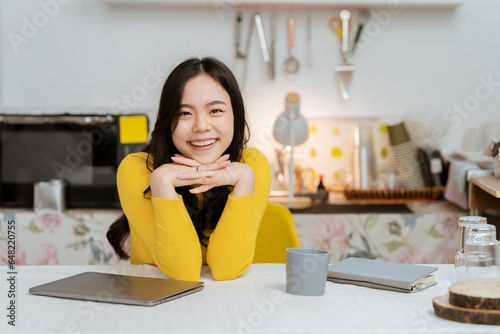 Small business owner  successful businesswoman  beautiful woman standing in coffee shop Portrait of a tanned Asian woman  barista  cafe  business concept owner  seller  SME