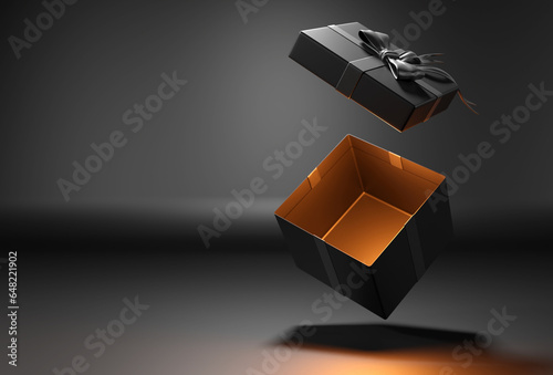 Open gift box or present box with red ribbon and bow  on black background with shadow