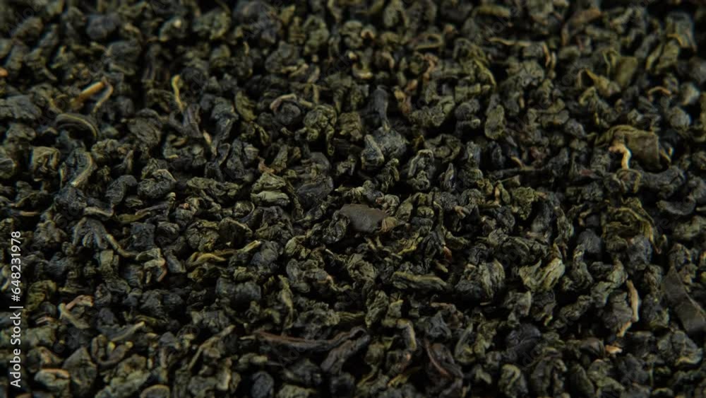 Black Dry Tea Wallpaper. Wooden spoon picks up Mix Black and Green Tea Leaves. Close Up, Macro. Top View. Texture. Copy Space. Dried Tea is Spinning, Rotating on Turntable. Food and Drink Background
Black Dry Tea Wallpaper. Wooden spoon picks up Mix Black and Green Tea Leaves. Close Up, Macro. Top View. Texture. Copy Space. Dried Tea is Spinning, Rotating on Turntable. Food and Drink Background
