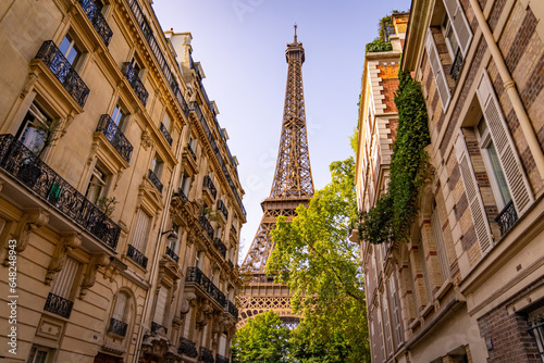 Sticker Beautiful view to the Eiffel Tower in Paris between the typical mansions - trave