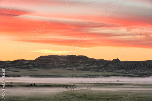 Sunrise Over 70 Mile Butte, Grasslands National Park; Saskatchewan, Canada photo