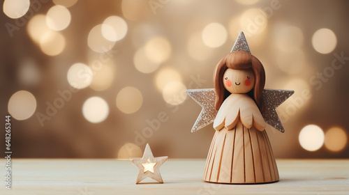 wood figurine of an christmas angel in front of an bokeh background