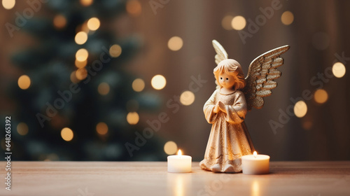 wood figurine of an christmas angel in front of an bokeh background with a christmas tree