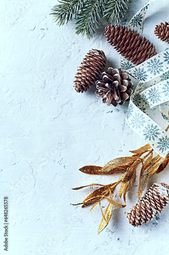 An arrangement of Christmas decorations on white background. Flat lay. Copy space
