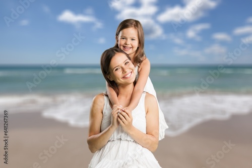 Happy young family, mother with cute daughter