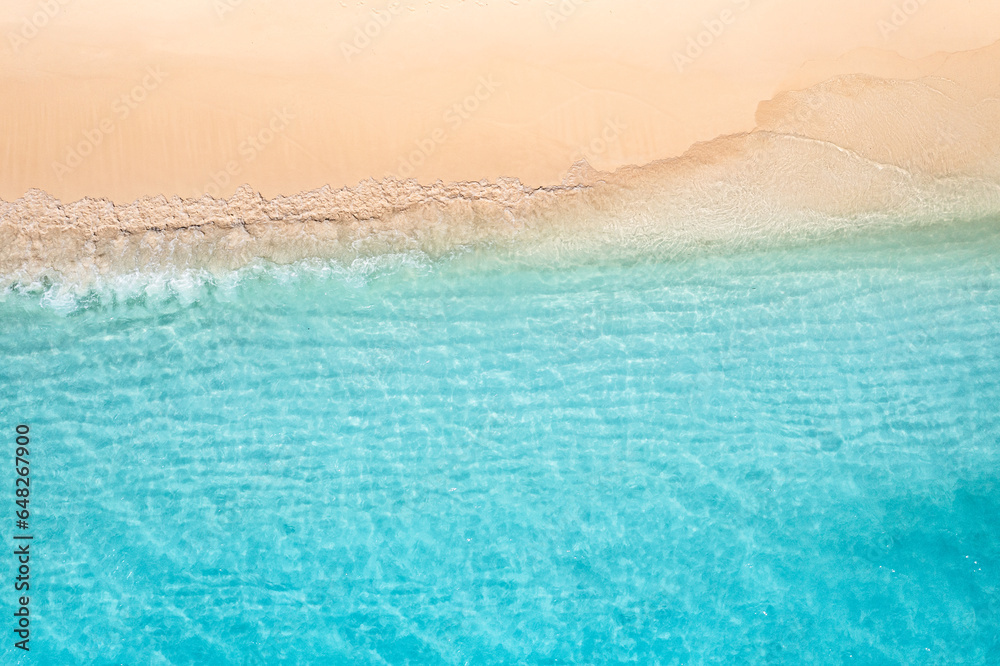 Relaxing aerial beach, summer vacation tropical Mediterranean landscape banner. Waves surf amazing blue ocean lagoon, sea shore coastline. Beautiful aerial drone top view. Peaceful beach, seaside surf