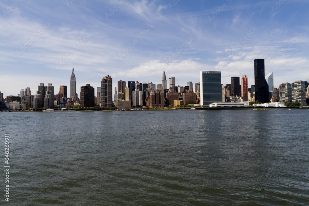 Manhattan Skyline, As Seen From The East River, New York City, New York, United States Manhattan Skyline, As Seen From The East River, New York City, New York, United States