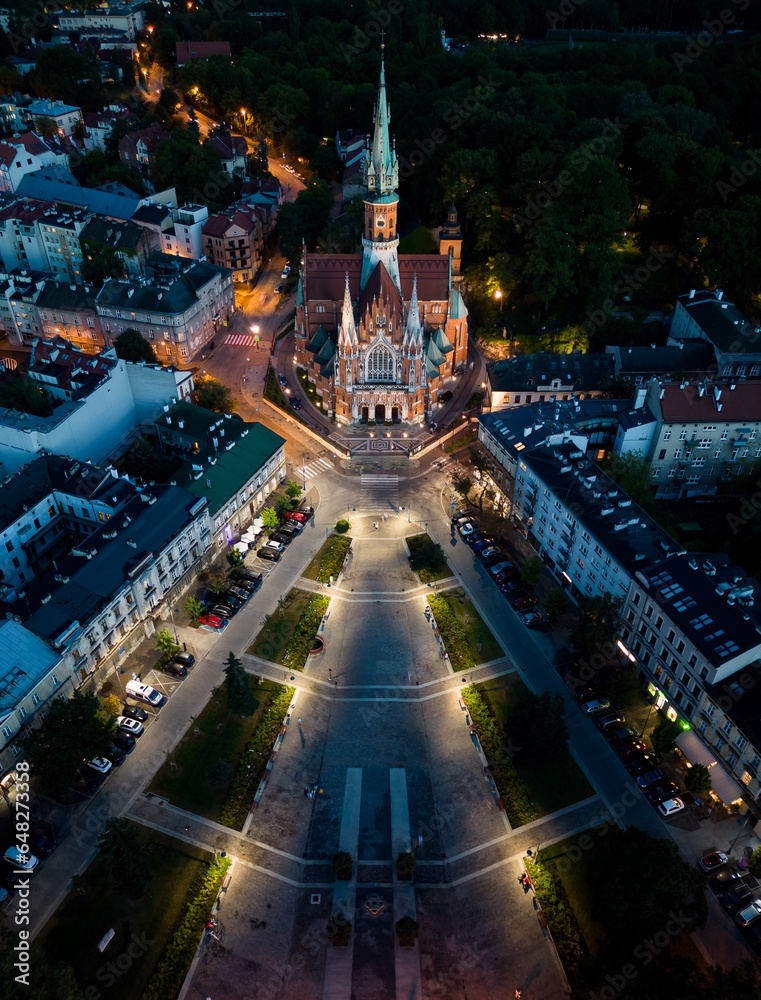 St Joseph church on Rynek Podgorski square, Krakow, Poland, aerial view in the night - obrazy, fototapety, plakaty 