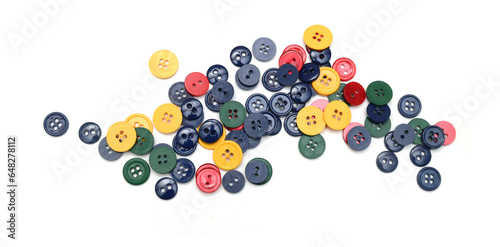 Various sewing buttons with a thread. photo
