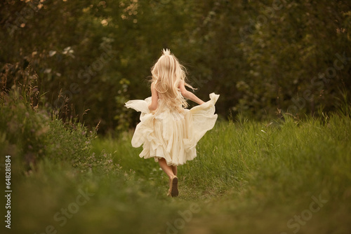 Girl in a Dress Running Down a Path