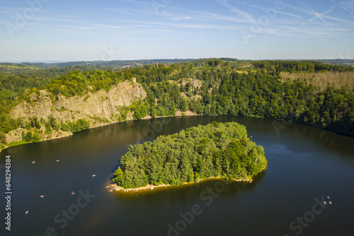 Aerial view of lake Sec with beautiful island. Famous tourist destination in Pardubicky kraj, Czech republic, European union.