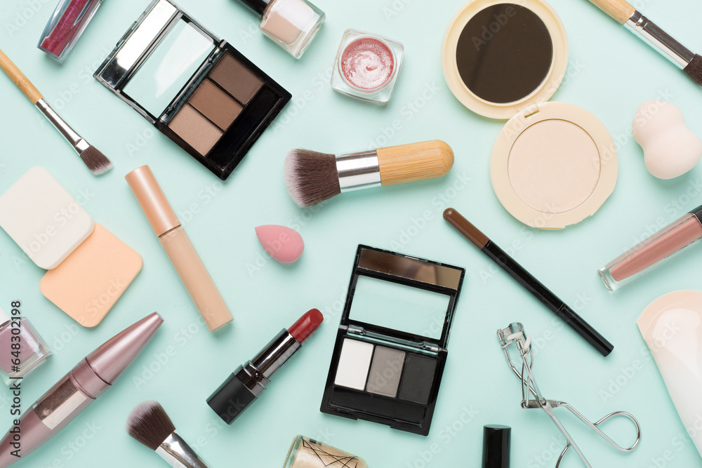 Flat lay with makeup products and tools on color background Flat lay with makeup products and tools on color background