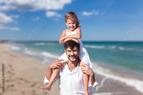 Happy young family, dad with cute daughter © BillionPhotos.com