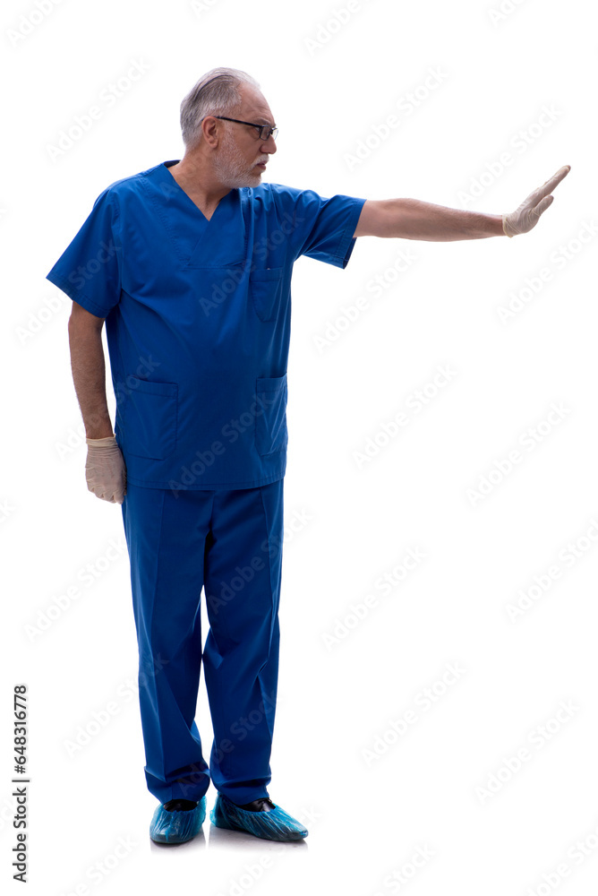 Old male doctor isolated on white Old male doctor isolated on white