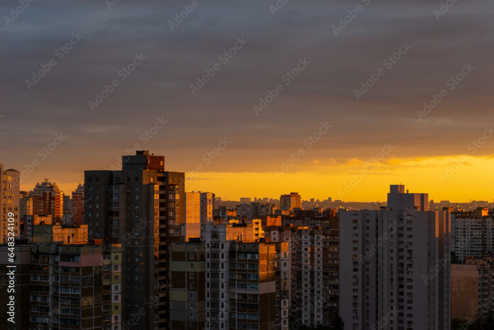 Sunset over soviet buildings of the Kyiv, capital of Ukraine
