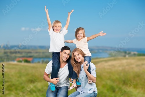 Happy young parents and child walking