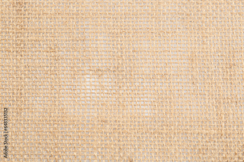 Texture of burlap fabric as background, top view photo