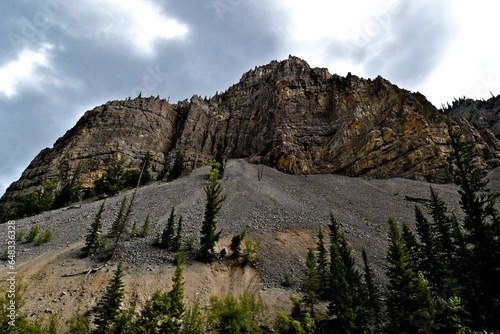 Talus slop emanates from hidden canyon below carbonate rocks of Mississippian Age, Bull Creek Quadrangle, Wyoming  photo
