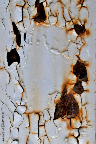 Rusty paint-cracked wall abstract photo