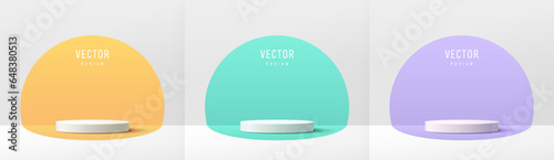 Set of white 3d cylinder pedestal podium with pastel orange, purple and green in semi circle wall scene. Abstract composition minimal in design. Platform product display presentation. Stage showcase.