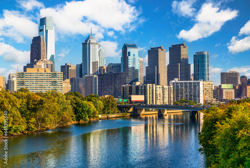 Philadelphia skyline and Schuylkill river. Philadelphia, also known as Philly, is the largest city in Pennsylvania and the second most populous city in the Mid-Atlantic and Northeast regions photo