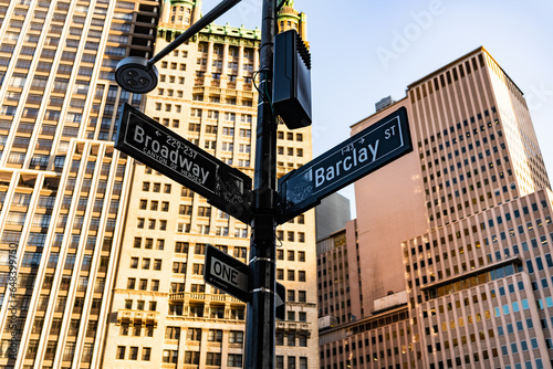 New York City, USA - May 12, 2023: street name sign with lamp at Manhattan Broadway and Barclay street © be free