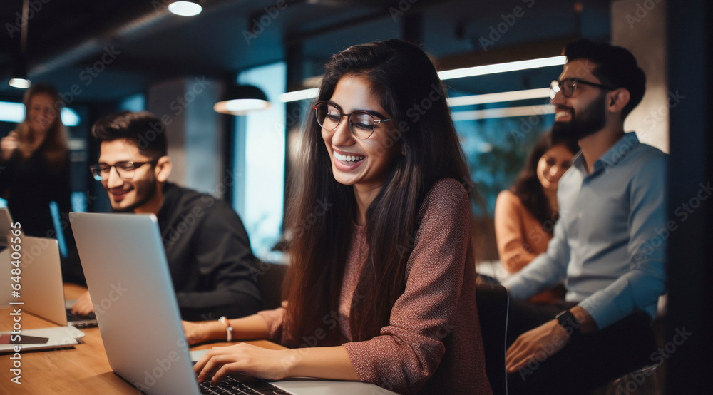 Corporate employees working on laptop at office. Corporate employees working on laptop at office.