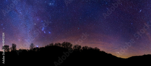 astrophotography of the winter milky way in the mountains