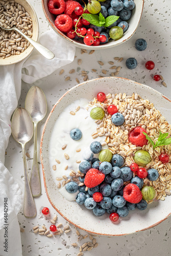 Sweet and fresh oats with seeds and berry fruits.