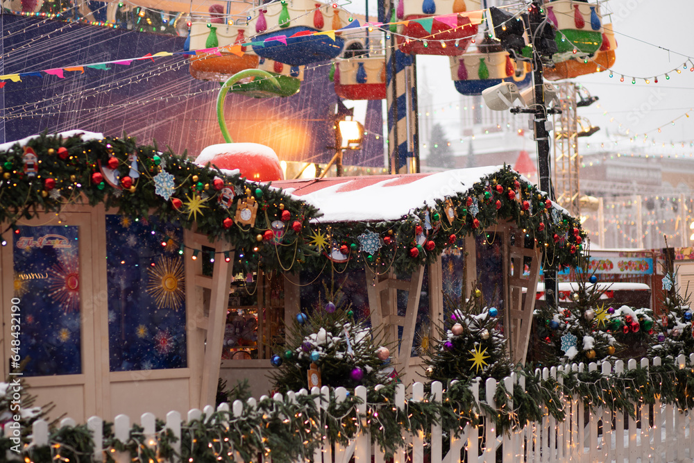 christmas market,stall houses with gifts,winter holiday tourism, atmospheric lights christmas market,stall houses with gifts,winter holiday tourism, atmospheric lights