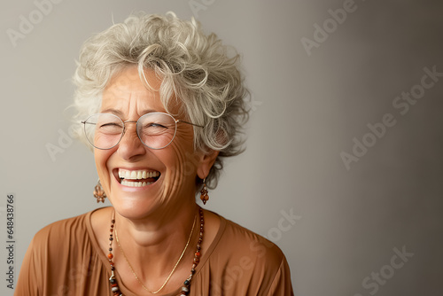 a closeup photo portrait of a beautiful elderly senior model woman with short grey hair laughing and smiling with clean teeth. used for a dental ad. isolated on white background. Generative AI © Shubby Studio