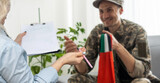 a soldier with the UAE flag at a psychologist