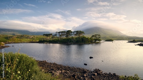 Beautiful lakeside landscape scenery with Twelve pines island surrounded by mountains at Connemara National park in County Galway, Ireland 