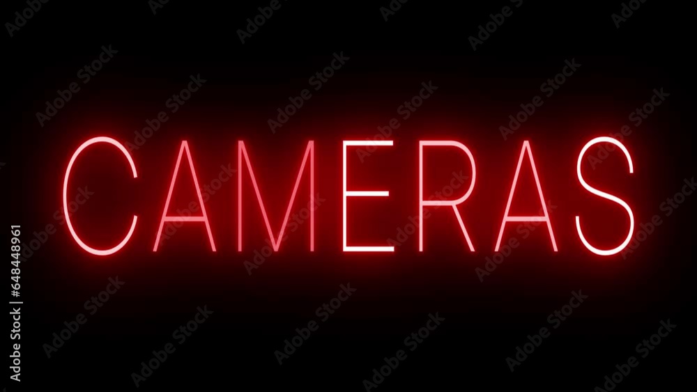 Flickering red retro style neon sign glowing against a black background Flickering red retro style neon sign glowing against a black background