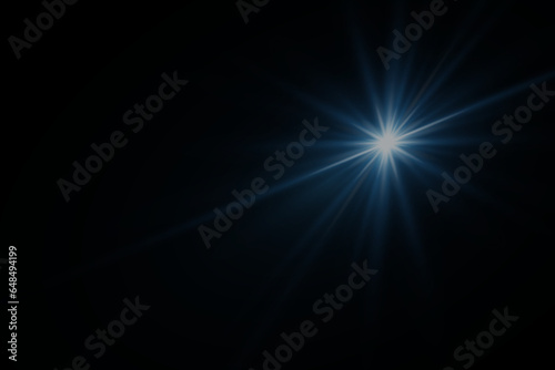 Glares of light. Beautiful digital flash. Abstract glowing lens flares on a dark background.