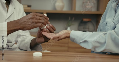 Adult woman having a visit at male doctor's office