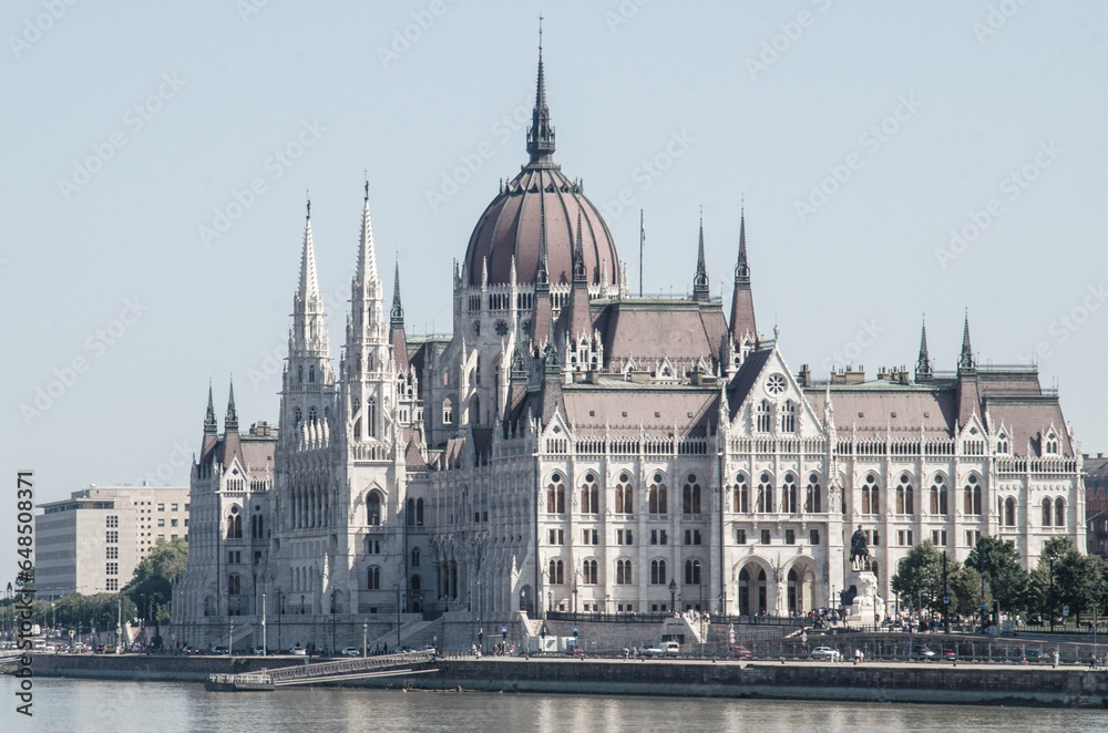 Historical Building of Hungarian Parliament in Budapest, view from Danube River.