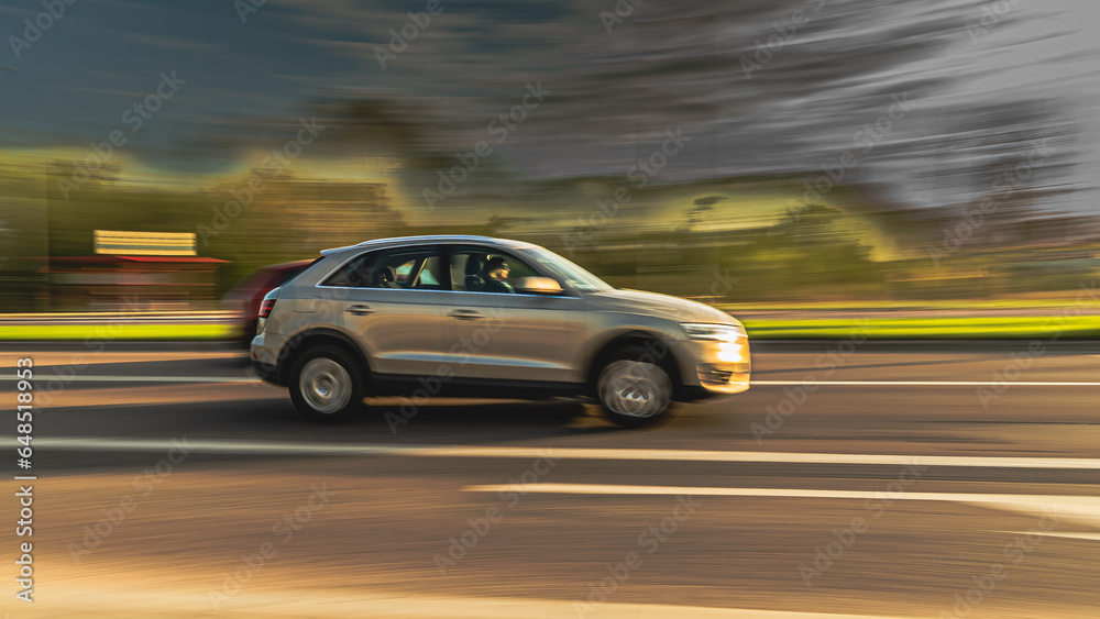 22 april 2023.Bialystok.Poland.Paning shot -car in motion with a blurred background.