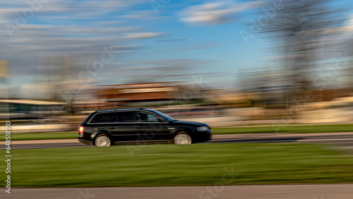 22 april 2023.Paning shot -car in motion with a blurred background. © Zdzislaw