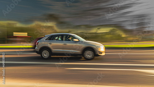 22 april 2023.Bialystok.Poland.Paning shot -car in motion with a blurred background. © Zdzislaw