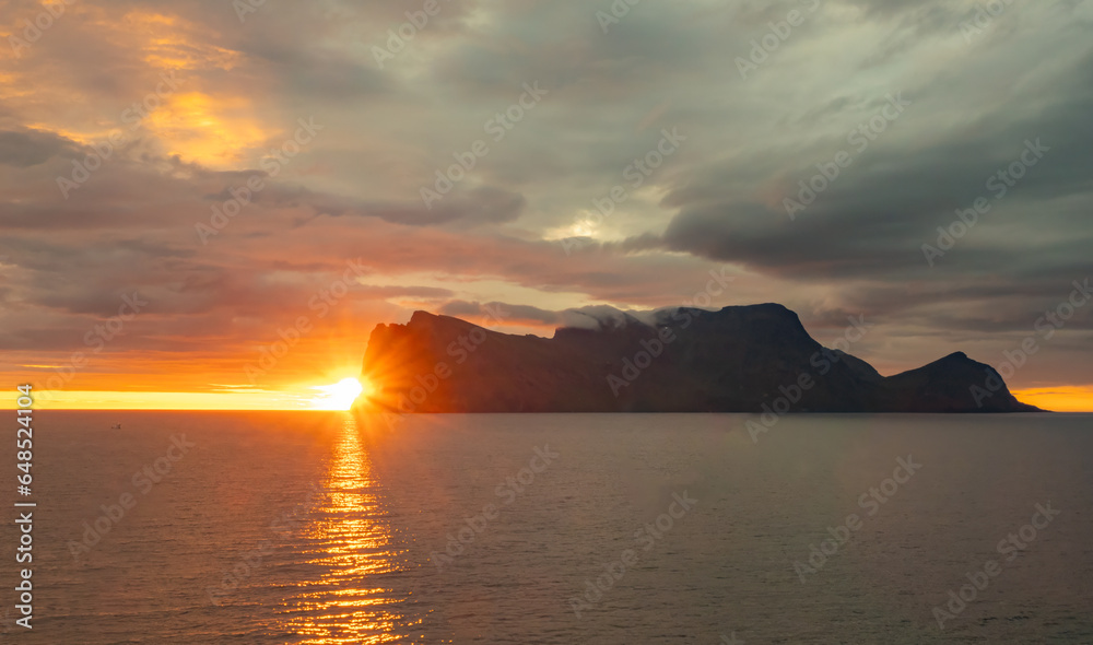 Spectacular midnight sun while sialing north of Tromsø, Troms of Finnmark, Norway