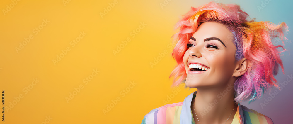 Young beautiful smiling happy woman with rainbow colored wavy hair isolated on flat yellow background with copy space, banner template of Creative hair coloring. - obrazy, fototapety, plakaty 