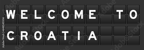 Black color analog flip board with word welcome to croatia on gray background