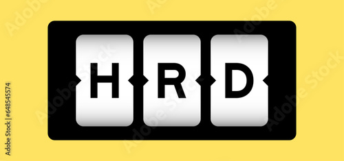 Black color in word HRD (Abbreviation of human resource development) on slot banner with yellow color background