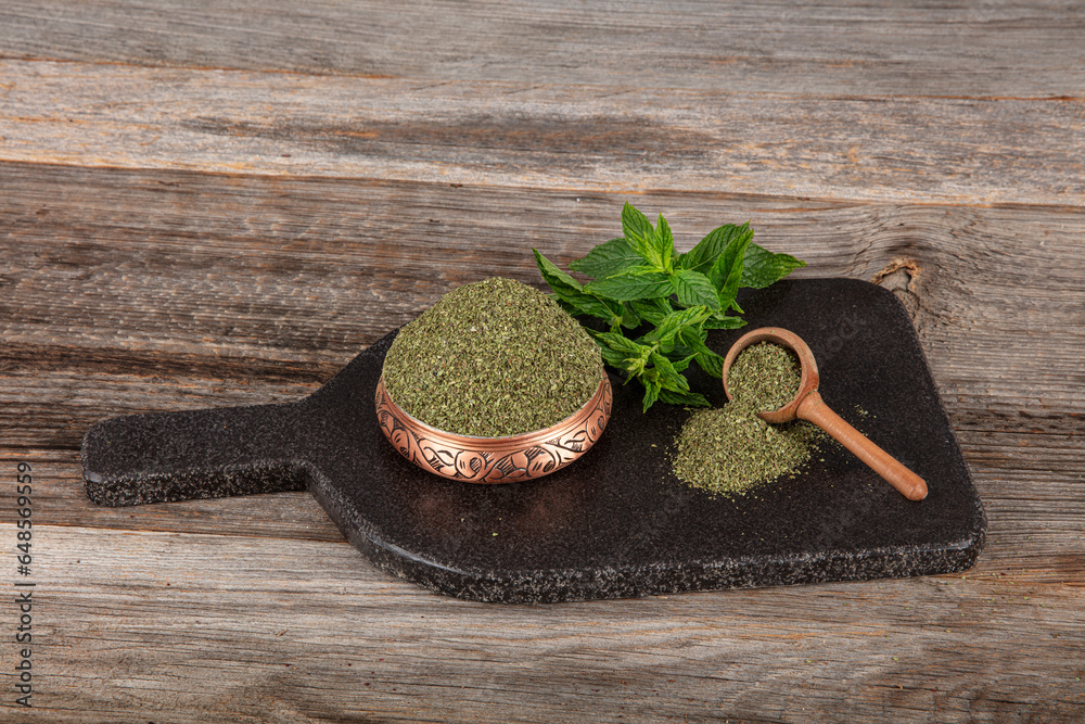 Natural dried mint herb (Mentha). Pile of Whole Dry (Dried) Mint Leaves. Dried Mint. Dried
