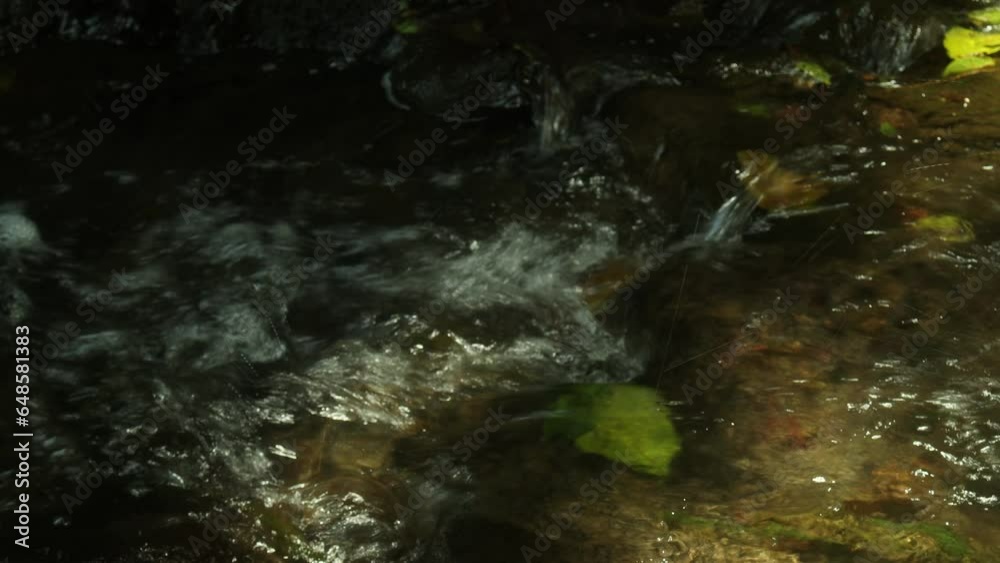Natural rivers are formed on rocks and contain ripples of clear water.
