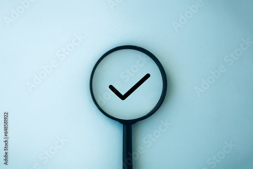 Magnifying glass and check mark icon. Business concept,idea,right choice, quality control, approval and contract assignment