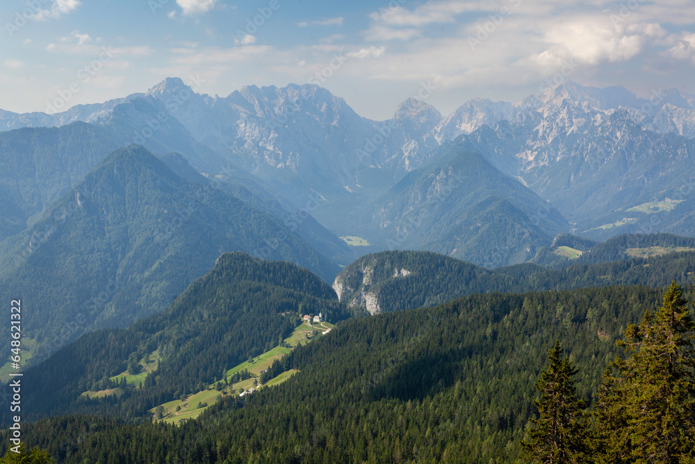 Panoramic view of small village Podolseva with St Spirit ( Sveti Duh) church at Kamnik-Savinja Alps, Slovenia