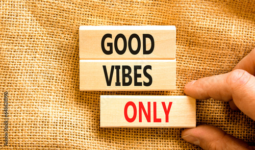 Good vibes only symbol. Concept word Good vibes only on beautiful wooden block. Businessman hand. Beautiful canvas table canvas background. Business motivational good vibes only concept. Copy space.