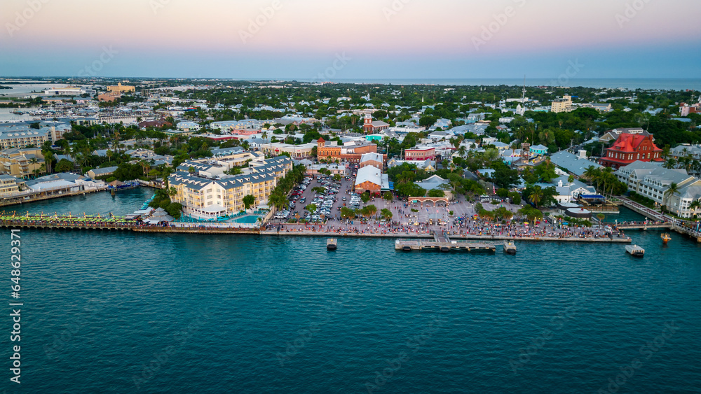 Naklejka premium Mallory Square and Duval street in key west aerial view of people gathering for sunset